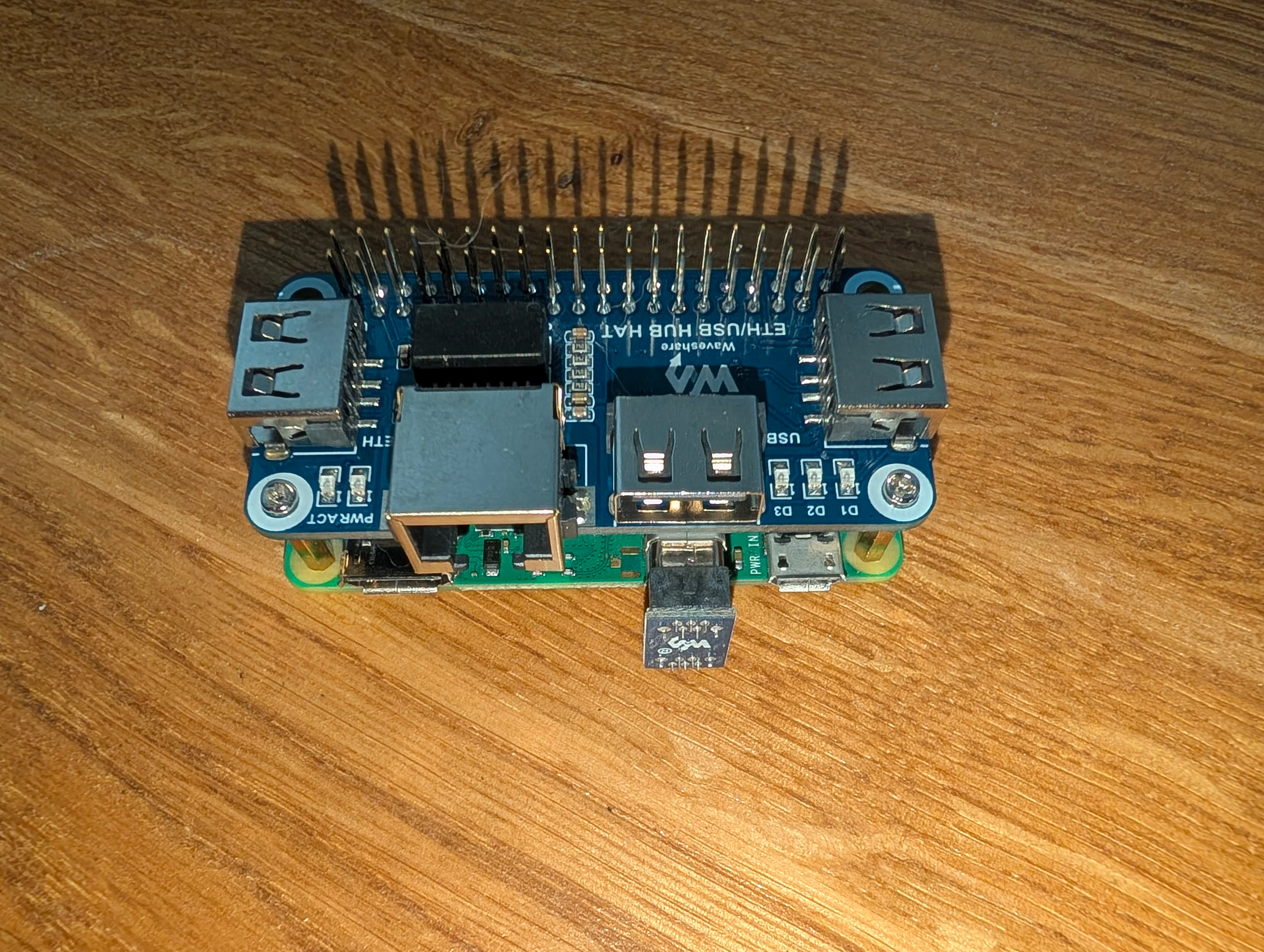 A Raspberry Pi zero 2W with an Ethernet HAT installed on top of it